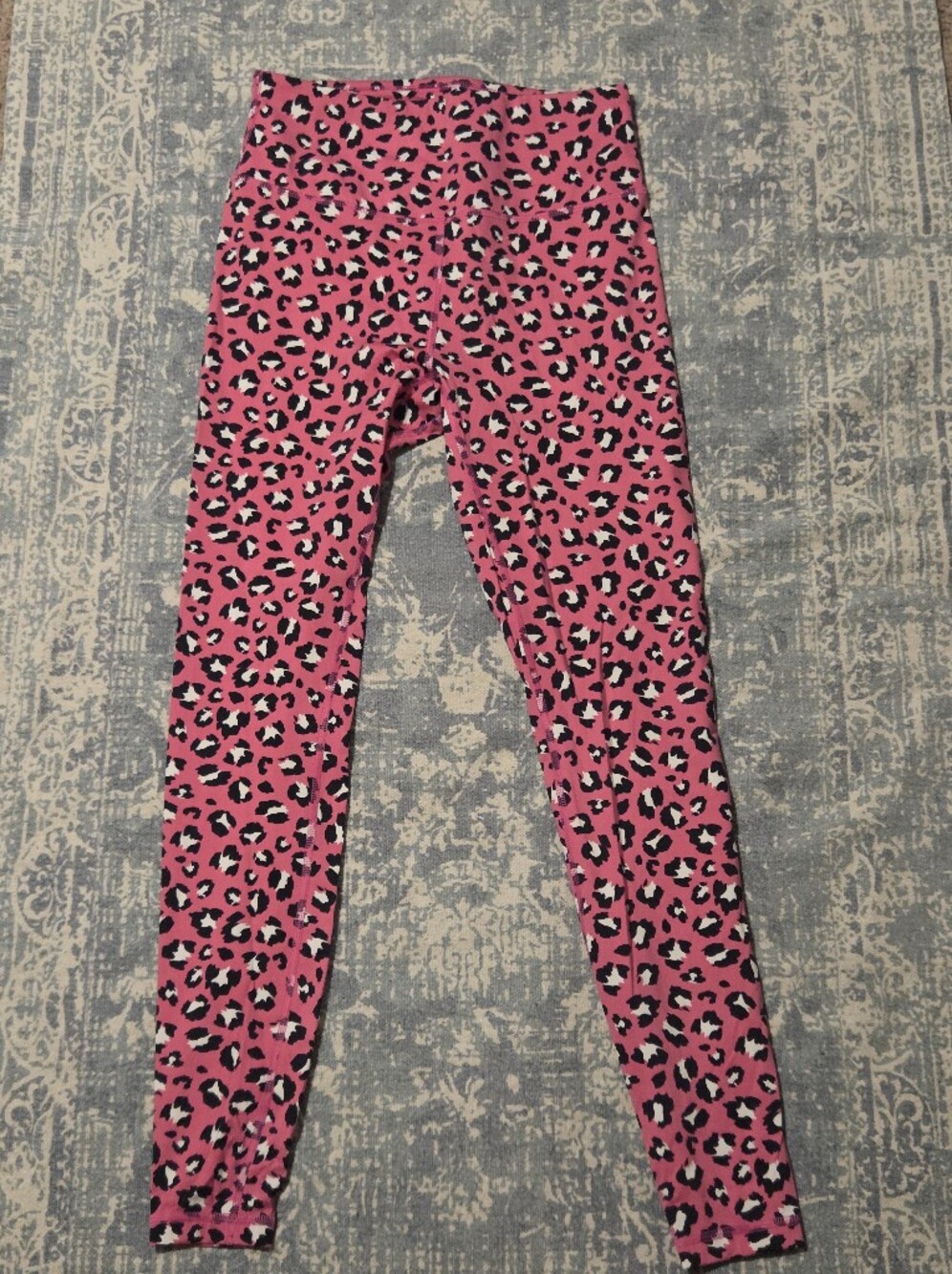 Bold animal print for a statement look leggings size small Cabana Crown & Ivy